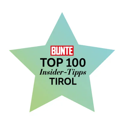 Türkisfarbener Stern mit der Aufschrift Bunte Top 100 Insider-Tipps Tirol
